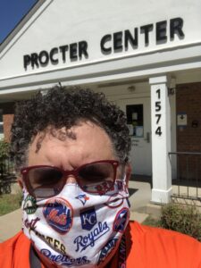 Selfie photo of Fred standing in front of the Procter Center
