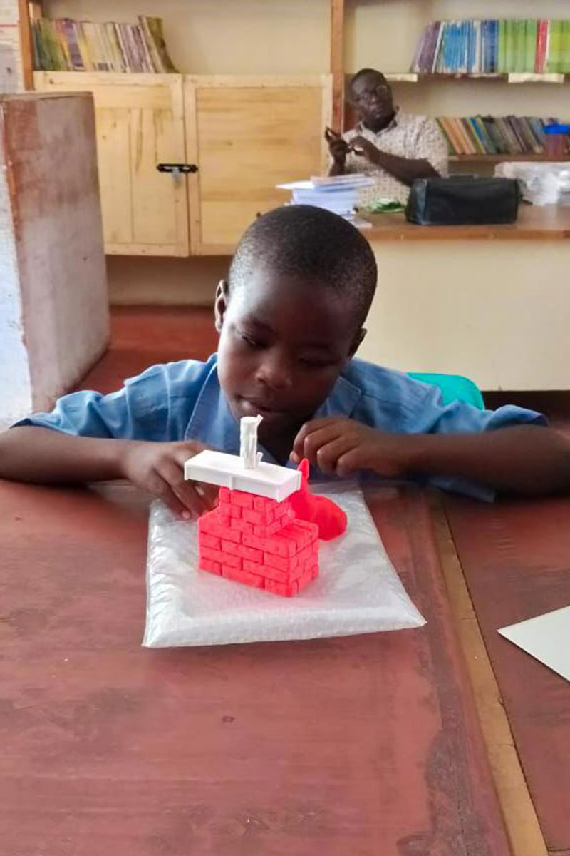 A student interacts with a 3D model.